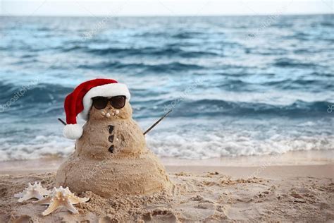 Snowman Made Of Sand — Stock Photo © Belchonock 121885816 Snowman