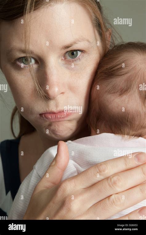 Angry Mother Holding Baby Stock Photo Alamy