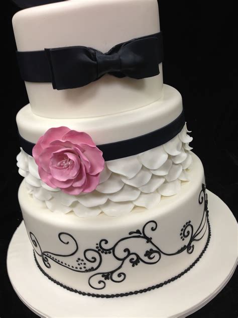 Maybe you would like to learn more about one of these? Fondant cake with petal look and handmade flower ...