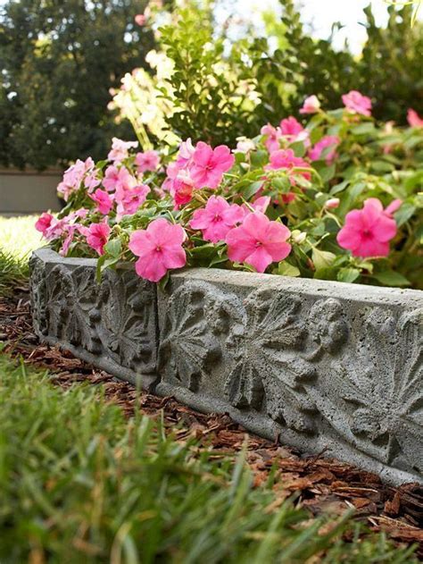 If you're having trouble deciding between various lawn edging ideas, consider concrete or brick pavers. Cast in Stone: DIY Landscape Accent | Concrete edging, Concrete garden, Garden edging