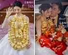 廣東新娘掛滿90只金手鐲 被譽為「最強頸椎」