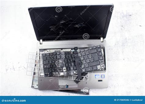 The Laptop Is Smashed To Pieces The Screen Is Cracked The Keyboard Is