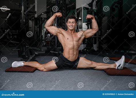 Splits Stretches Man Stretching Legs In The Gym Handsome Fitness Stock Image Image Of
