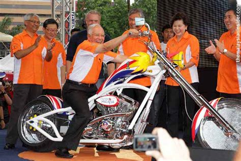 Great savings & free delivery / collection on many items. Shup up and ride: Malaysian Prime Minister on a Chopper Bike