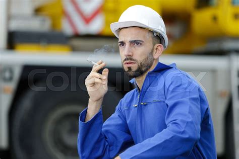 Smoking Worker In Construction Site Stock Image Colourbox