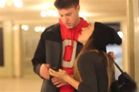 Girl Attempts To Kiss Unsuspecting Strangers In Grand Central Station