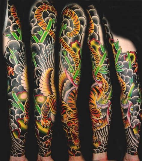 It signifies wisdom on the one hand, and cruelty on the other hand. Tiger Sleeve Tattoo by Myke Chambers: TattooNOW