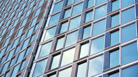 Structural Glass Wall Reflecting Blue Sky Abstract Modern Architecture