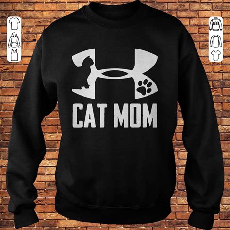 In case you haven't heard, the cat lady isn't the sad, outdated cliche portrayed in books and on television. Cat Mom Under Armour shirt, hoodie, sweater, longsleeve t ...