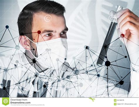 Portrait Of Concentrated Male Scientist Working With Reagents In