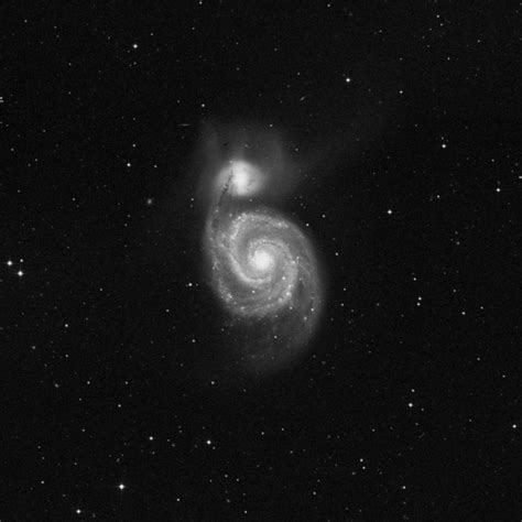Messier 51 Whirlpool Galaxy Intermediate Spiral Galaxy In Canes