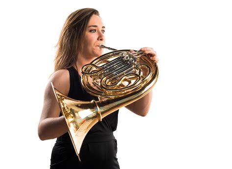 Premium Photo Girl Playing The French Horn