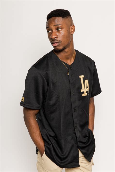 No jersey worn on the field has the la logo on it or 'los angeles' or 'dodgers' in block lettering. LOS ANGELES DODGERS MAJESTIC REPLICA BASEBALL JERSEY- MENS ...