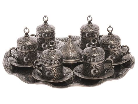 An Ornate Silver Tea Set On A Tray