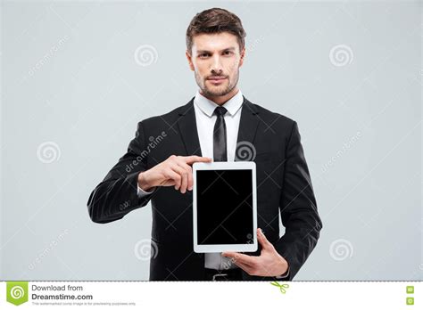 Handsome Young Businessman Holding Blank Screen Tablet Stock Photo