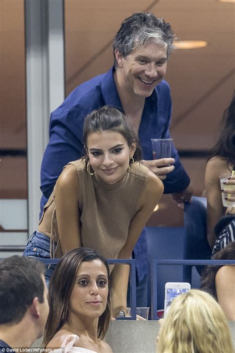 Emily Ratajkowski Shows Off Pert Derriere As She Sits In The Stands At