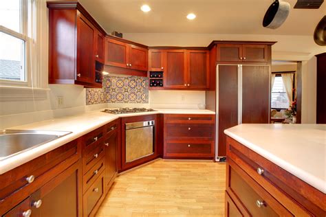 If you're looking for a versatile, durable and low cost alternative to wood cabinets—in particular if you have a contemporary or modern look in mind for your kitchen—laminate. Mahogany Kitchen Cabinets - Modernize | Mahogany kitchen ...