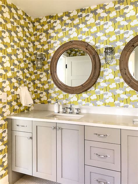 Bathroom With Bold Floral Wallpaper And Gray Vanity Bathroom