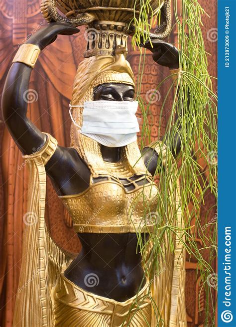 cleopatra`s nubian servant statue with mask stock image image of historic culture 213973009