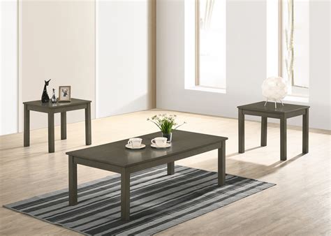 If your living room is missing a finishing touch, adding a new coffee table and end tables is a great way to add structure and definition without crowding the room with extra seating. 4711 Pierce Grey Coffee and End Table Set • Urban ...