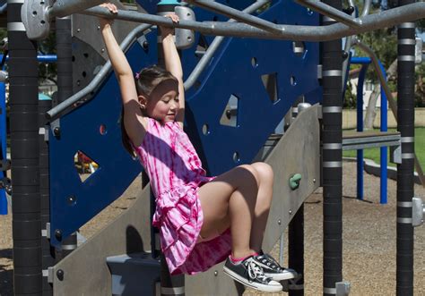 Girls Are Carefree On The Playground When They Are Wearing Their