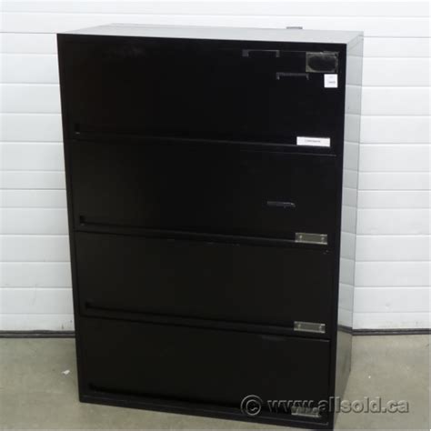 Lateral file cabinets are a great way to organize office files while conserving space. Black 36" 4 Drawer Flip Front Lateral File Cabinet ...