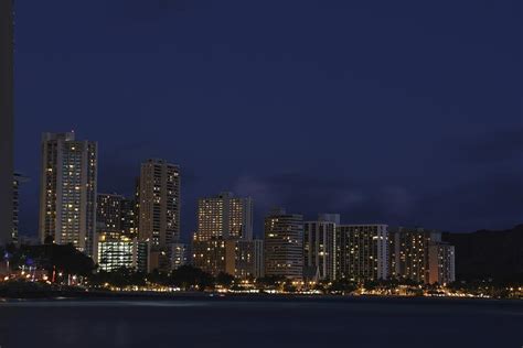 Nighttime On The Beach In Waikiki Photograph By Andrea Mcclinnis Fine