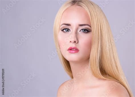 Beautiful Blonde Model Woman Face With Blue Eyes And Perfect Make Up
