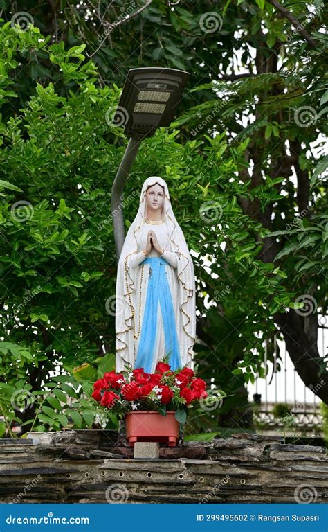 Statue Of Our Lady Of Grace Virgin Mary View With Natural Background In