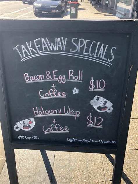 I ordered a drip coffee and my wife ordered her classic vanilla latte with oak milk. Sign at a local coffee shop near me! : Cuphead