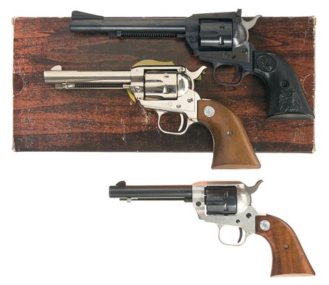 Three Colt Single Action Revolvers A Colt New Frontier 22 Model