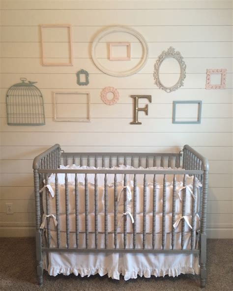 With brass accents and a gender neutral palette of grays, whites, and just a touch of green with the magnolia wreaths, this modern farmhouse nursery is a high class baby nursery for boy or girl. Finley Mack's Farmhouse Nursery - Project Nursery