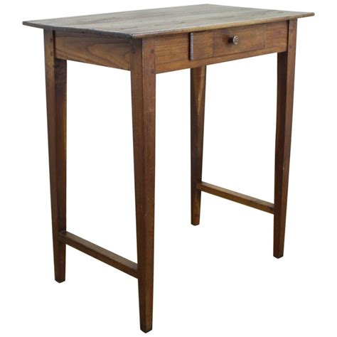 A classic and elegant coffee table if we have ever seen one. Tall Antique Chestnut Side Table with Stretchers For Sale ...