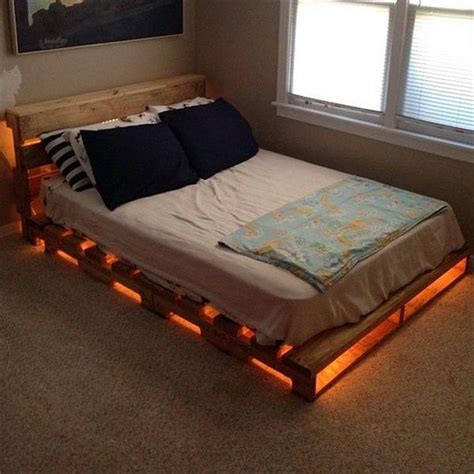 In a dark room the floating lights were tested again to assure everything was in place and working properly. Illuminated Pallet Bed | The Owner-Builder Network