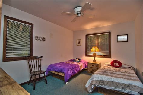 The Kids Will Enjoy Relaxing In This Bedroom At Our Lakefront Home For