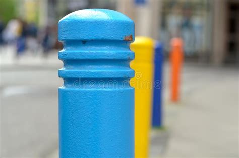 Row Of Brightly Colored Bollards On A Street Stock Image Image Of