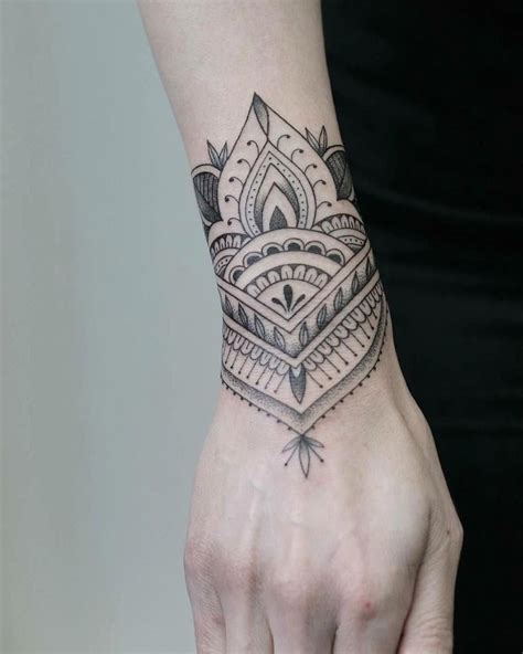 small-wrist-tattoo-smallwristtattooformen-in-2020-cuff-tattoo,-cuff