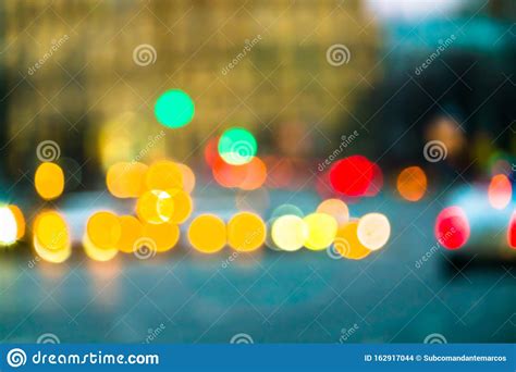 Evening City Traffic In A Giant Metropoliscity Light Bokeh Background