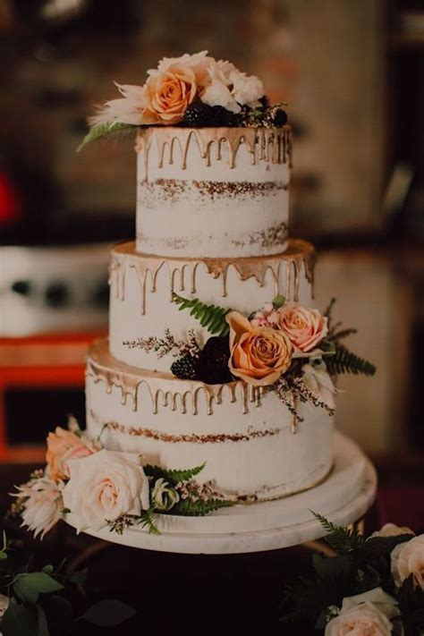 Semi Naked Dripped Wedding Cake With Florals Emmalovesweddings