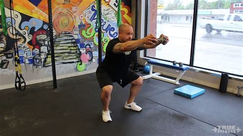 Db Squat To Front Raise Youtube