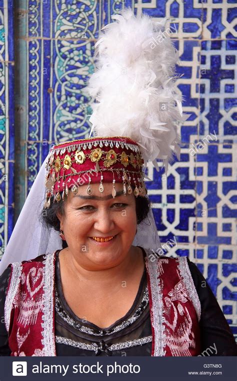 Traditionally Dressed Uzbek Woman Posing At Tosh Hovli Palace In Khiva