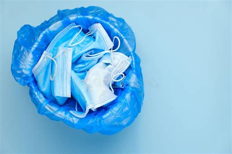 Mask Thrown In The Trash Discarded Surgical Masks Medical Waste With