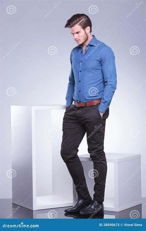 Sad Casual Man Standing With Hands In Pockets Stock Photo Image 38890673