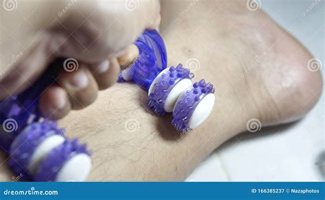 Image Of Massage Tools Massaging A Man`s Leg Stock Image Image Of Massager Closeup 166385237