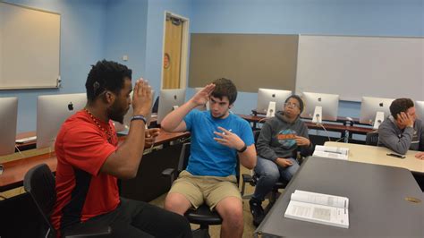 B A In American Sign Language Gallaudet University