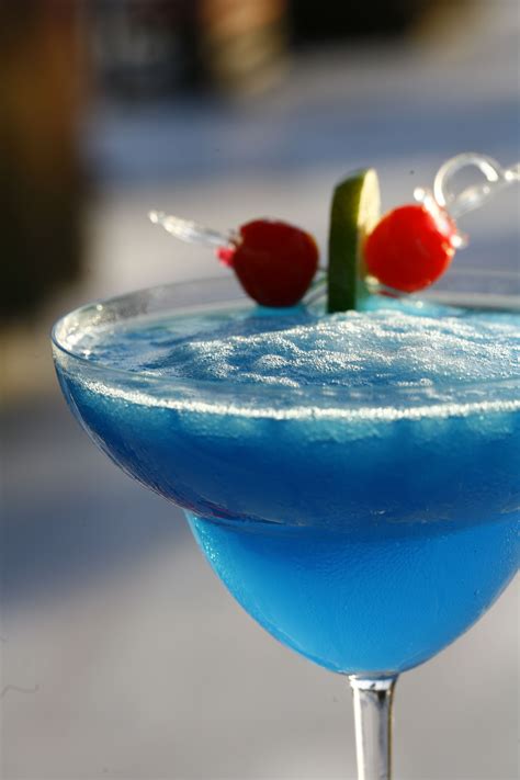 Heavenly Blue Cocktail Blue Drinks Strawberry Drinks Flavored Drinks