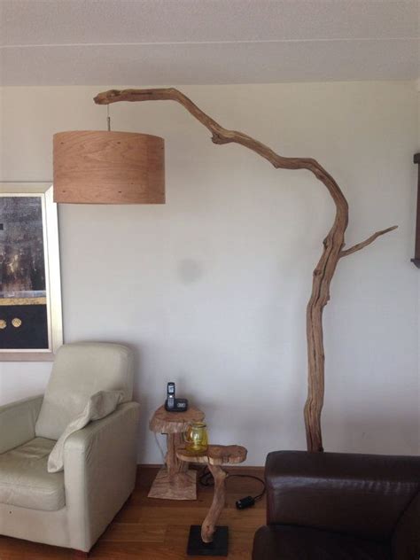 Arc lamp design allows to create relaxing room decorating ideas, that include soft light and simple lighting design. Unique floor lamp / Arc Lamp. made of oak branch by ...