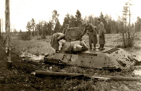 Abandoned T 34 Being Inspected By German Soldiers During Operation