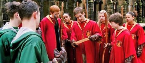 gryffindor and slytherin quidditch teams oliver wood photo 21187858 fanpop