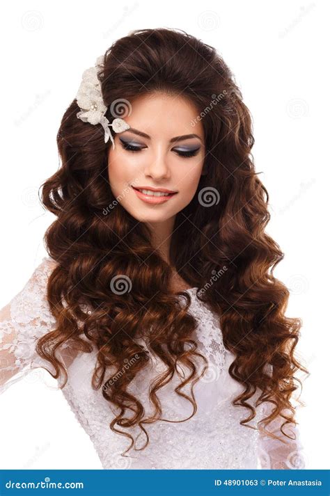 Portrait Of A Beautiful Young Brunette Girl In White Lace Wedding Dress